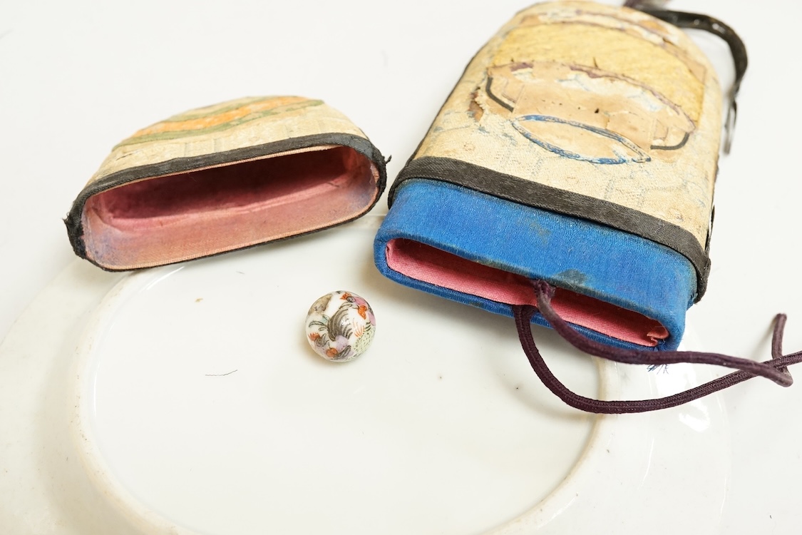 A Chinese embroidered spectacles case and an armorial oval miniature dish